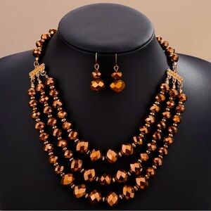 Metallic Bronze 3 Strand Necklace and Dangle Earrings Set